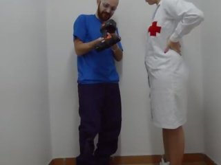 Nurse doing first aid on manhood