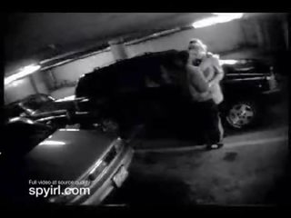 Security camera in spooning lot catches couple having adult clip