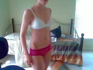 Young teen strips for her webcam movie