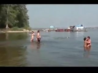 Very pretty naked girl fishing on public